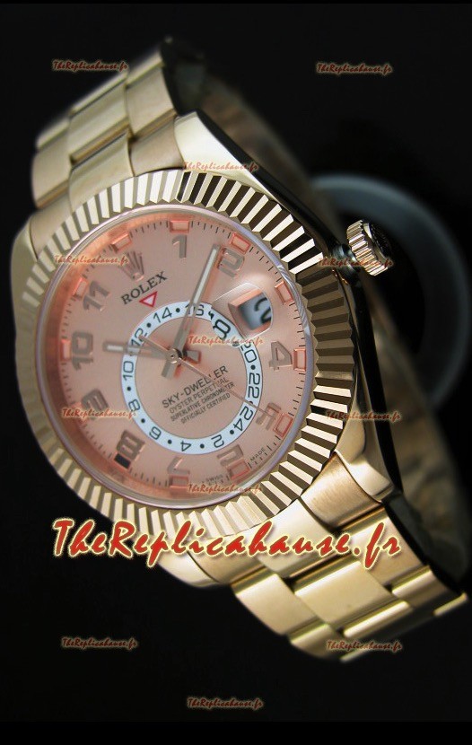 Montre en or rose 18K Rolex Sky-Dweller avec chiffres arabes sur cadran saumon