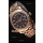 Rolex Day-Date 40MM Or Rose avec Cadran texturé Brun Marqueurs de bâton